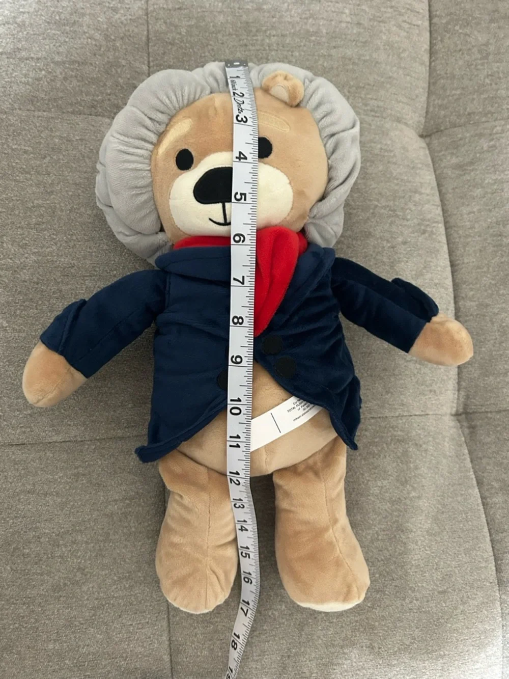 Plush Lion in Navy Jacket with Red Scarf